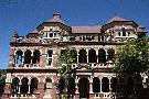 The Mansions is a heritage-listed group of six three-storey buildings in Brisbane CBD, Australia. Tupungato/Shutterstock The Mansions is a heritage-listed group of six three-storey buildings in Brisbane CBD, Australia. Tupungato/Shutterstock
